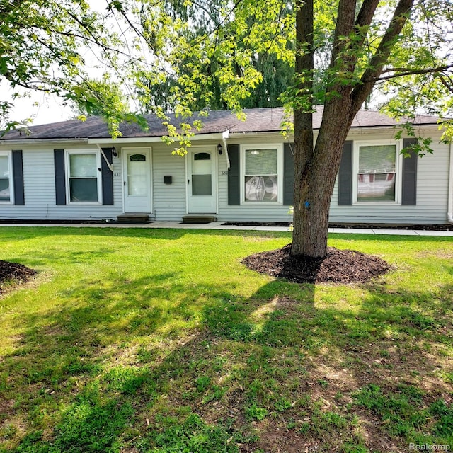 630 Aldrich St, Linden, MI 48451 - single story home featuring a front yard