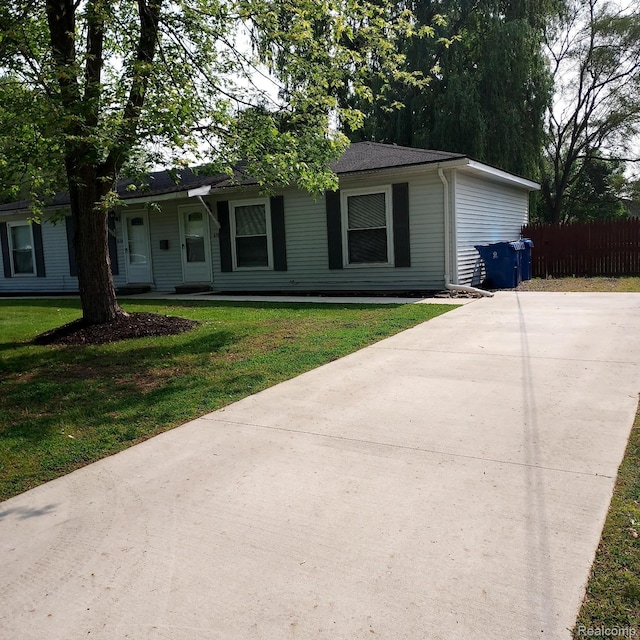 630 Aldrich St, Linden, MI 48451 - single story home featuring driveway and covered porch