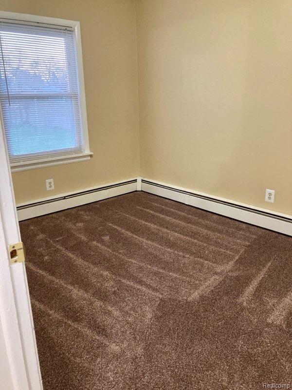 630 Aldrich St, Linden, MI 48451 - unfurnished room featuring carpet