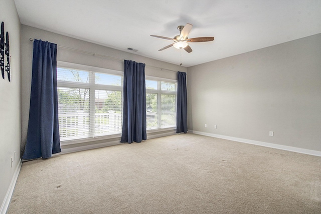 603 Woodland, Dexter, MI 48130 - unfurnished room featuring ceiling fan, carpet flooring, and baseboards