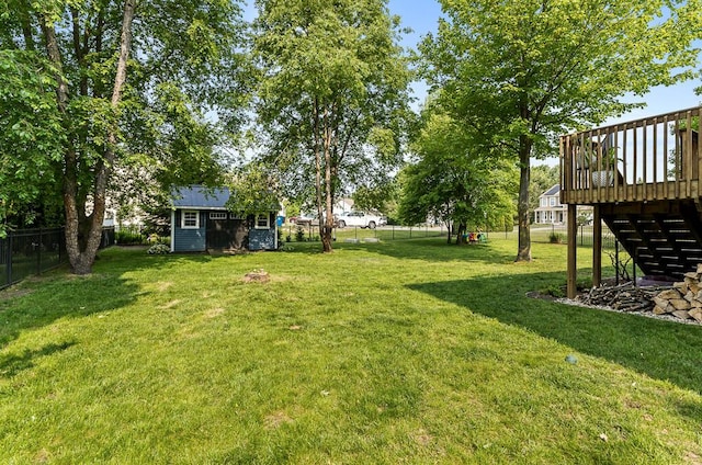5855 Larson Ln, Muskegon, MI 49444 - view of yard featuring a wooden deck and stairway