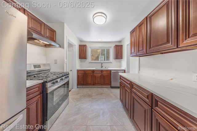 21167 Lancaster St, Grosse Pointe Woods, MI 48225 - kitchen with stainless steel appliances, range hood, and a sink
