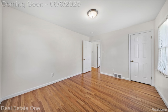 21167 Lancaster St, Grosse Pointe Woods, MI 48225 - unfurnished bedroom featuring light wood-style floors and baseboards
