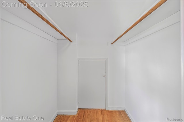 21167 Lancaster St, Grosse Pointe Woods, MI 48225 - walk in closet featuring light wood-type flooring
