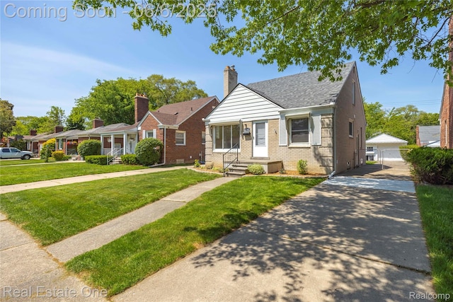 21167 Lancaster St, Grosse Pointe Woods, MI 48225 - bungalow with brick siding, a front lawn, an outdoor structure, a garage, and a chimney