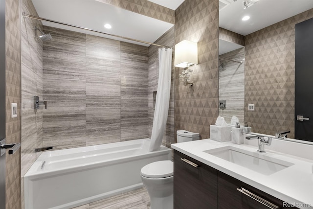 2051 Villa Rd Unit 203, Birmingham, MI 48009 - bathroom with shower / bath combo with shower curtain, toilet, vanity, and tile walls
