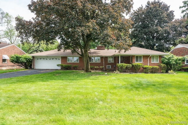 19419 Coral Gables St, Southfield, MI 48076 - ranch-style house with driveway, a garage, a front yard, a chimney, and brick siding