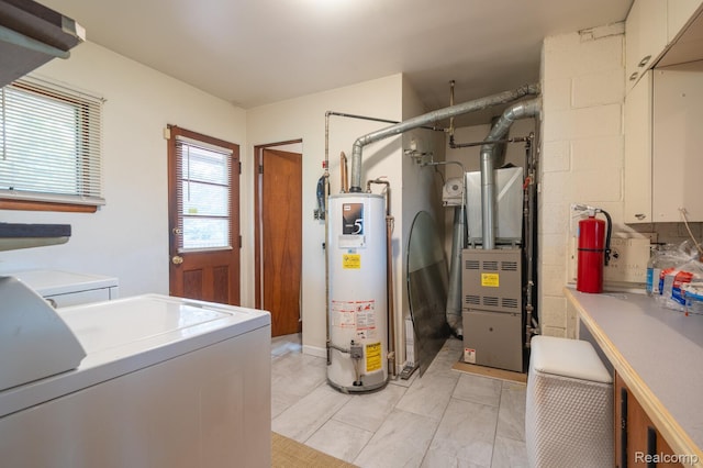 19419 Coral Gables St, Southfield, MI 48076 - utility room with water heater, heating unit, and independent washer and dryer