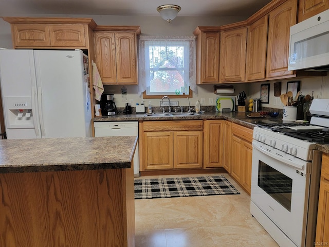1577 Benner Hwy, Clayton, MI 49235 - kitchen featuring white appliances, a sink, dark countertops, and light tile patterned floors