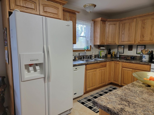 1577 Benner Hwy, Clayton, MI 49235 - kitchen with white appliances, a sink, and dark countertops