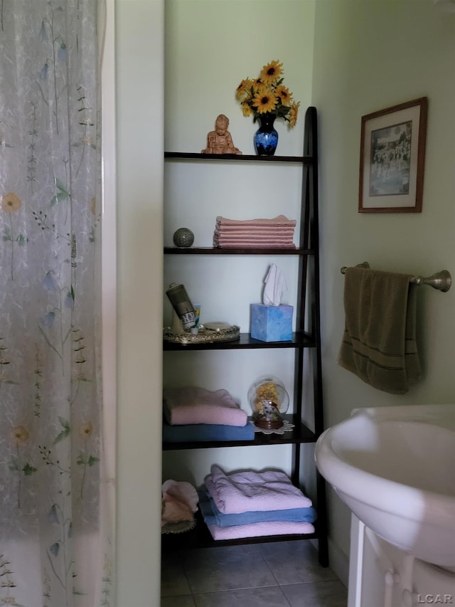 1577 Benner Hwy, Clayton, MI 49235 - bathroom with tile patterned flooring and a shower with curtain
