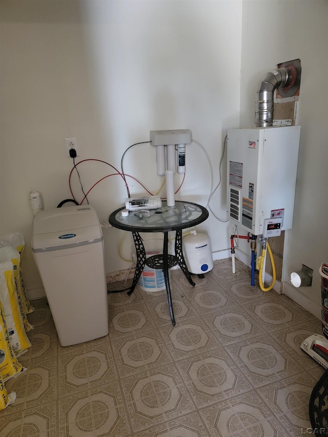 1577 Benner Hwy, Clayton, MI 49235 - utility room with water heater