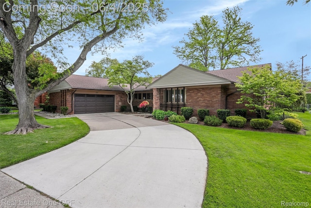 439 Barclay Rd, Grosse Pointe Farms, MI 48236 - view of front of home with an attached garage, driveway, a front yard, and brick siding