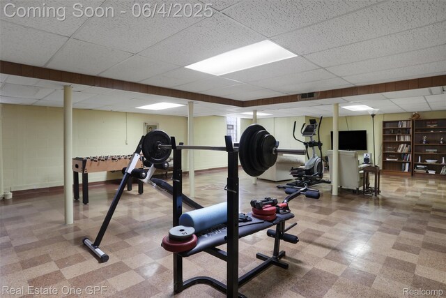 439 Barclay Rd, Grosse Pointe Farms, MI 48236 - exercise area with tile patterned floors and a paneled ceiling