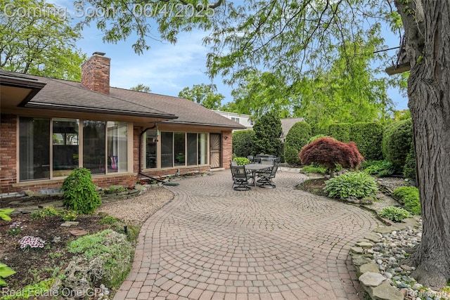 439 Barclay Rd, Grosse Pointe Farms, MI 48236 - view of patio / terrace featuring outdoor dining space and a sunroom