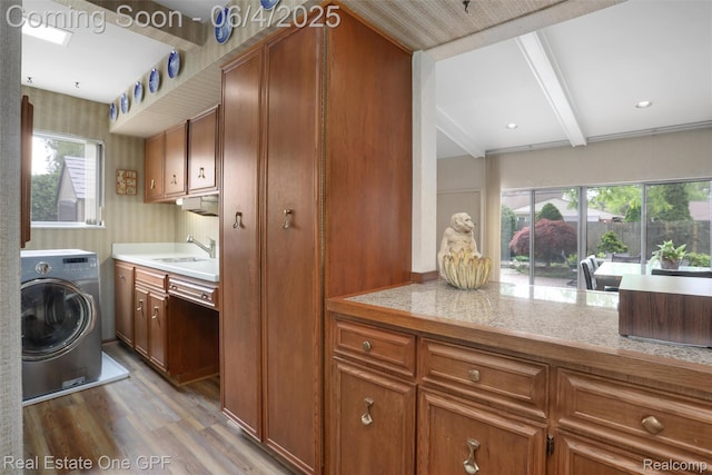 439 Barclay Rd, Grosse Pointe Farms, MI 48236 - washroom with washer / dryer, light wood finished floors, wallpapered walls, and a sink