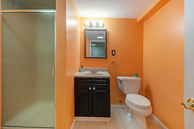 2305 S Circle Dr, Ann Arbor, MI 48103 - full bathroom with tile patterned flooring, toilet, vanity, a shower stall, and baseboards