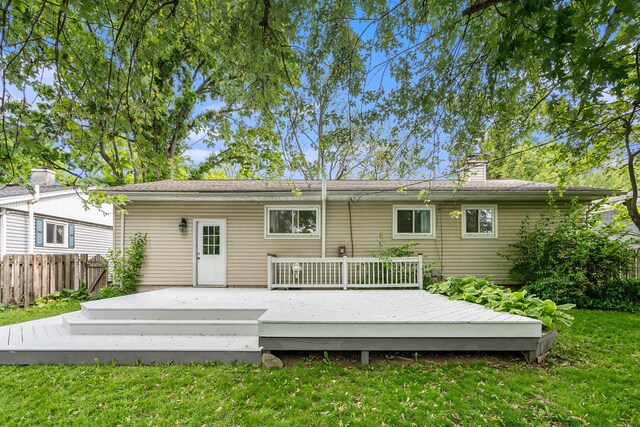 2305 S Circle Dr, Ann Arbor, MI 48103 - back of house featuring a chimney and a deck