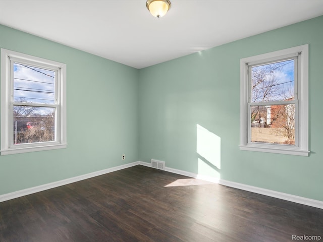 3752 Katherine St, Dearborn, MI 48124 - unfurnished room featuring dark wood-style flooring and baseboards