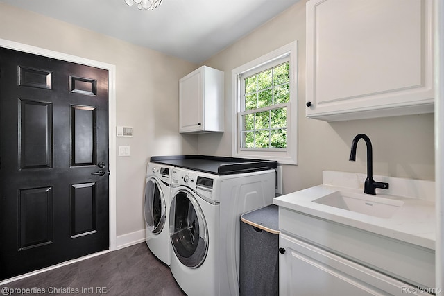 1707 Mountain Ash Dr, West Bloomfield, MI 48324 - laundry area with cabinet space, separate washer and dryer, and baseboards