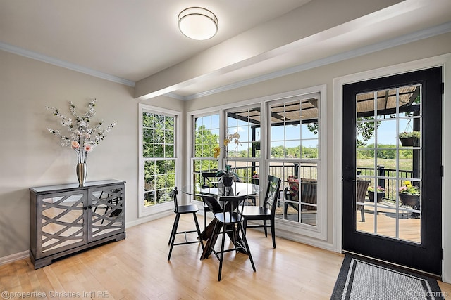 1707 Mountain Ash Dr, West Bloomfield, MI 48324 - dining room with light wood-type flooring, baseboards, and ornamental molding