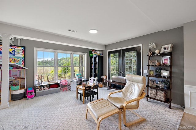 1707 Mountain Ash Dr, West Bloomfield, MI 48324 - carpeted office space with french doors and plenty of natural light