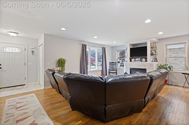 39650 Macomber St, Harrison Township, MI 48045 - living area with light wood-type flooring, a fireplace, recessed lighting, and baseboards