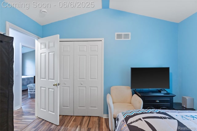 39650 Macomber St, Harrison Township, MI 48045 - bedroom with wood finished floors, vaulted ceiling, a closet, and baseboards