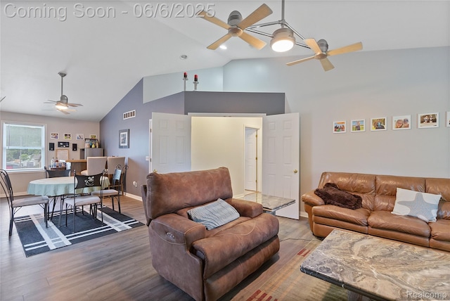 39650 Macomber St, Harrison Township, MI 48045 - living room with ceiling fan, high vaulted ceiling, wood finished floors, and baseboards