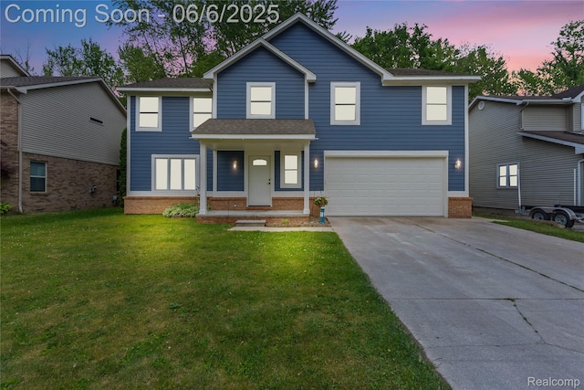 39650 Macomber St, Harrison Township, MI 48045 - view of front of property featuring a garage, brick siding, driveway, a front yard, and roof with shingles