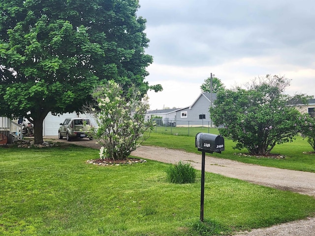 1610 Sunburst St, Grawn, MI 49637 - view of yard featuring driveway