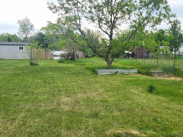 1610 Sunburst St, Grawn, MI 49637 - view of green lawn
