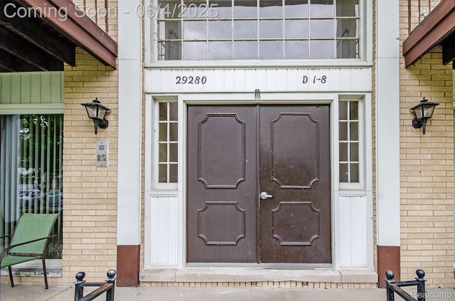 29280 Gloede Dr Unit D7, Warren, MI 48088 - property entrance with brick siding