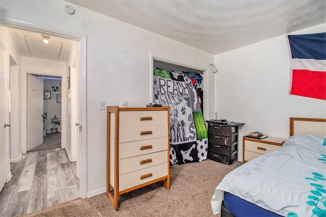 236 Mary St, Plainwell, MI 49080 - bedroom featuring attic access and wood finished floors