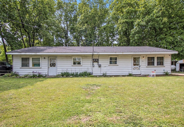 236 Mary St, Plainwell, MI 49080 - view of front of home with a front lawn
