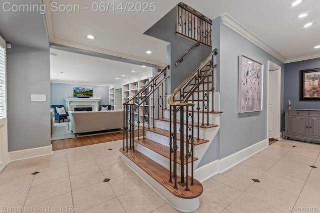 457 N Cranbrook Rd, Bloomfield Hills, MI 48301 - staircase with ornamental molding, tile patterned floors, a fireplace, and recessed lighting