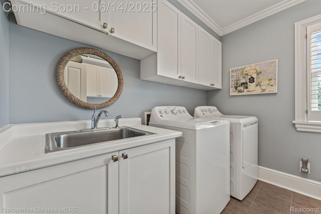 457 N Cranbrook Rd, Bloomfield Hills, MI 48301 - laundry area featuring cabinet space, independent washer and dryer, crown molding, healthy amount of natural light, and dark tile patterned flooring