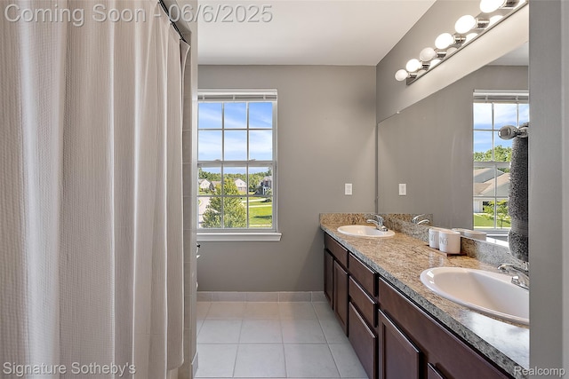 871 Wynstone Cir S, Oakland, MI 48363 - bathroom with double vanity, tile patterned floors, and baseboards