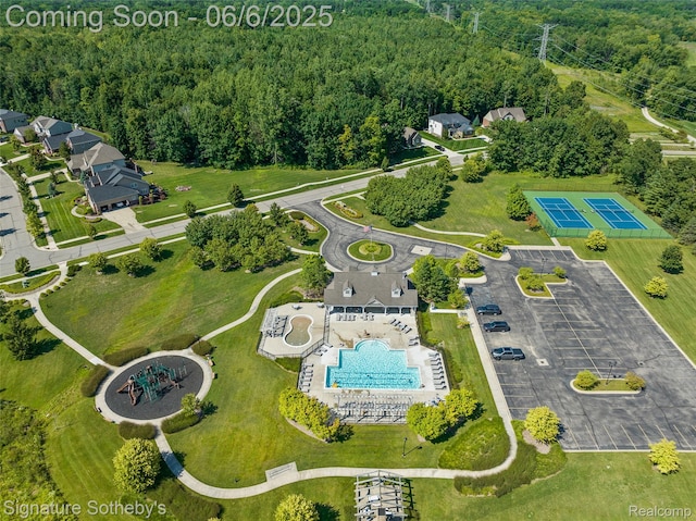 871 Wynstone Cir S, Oakland, MI 48363 - aerial view of a pool and a heavily wooded area