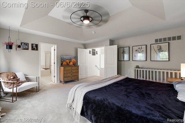871 Wynstone Cir S, Oakland, MI 48363 - bedroom with light carpet, a raised ceiling, and connected bathroom