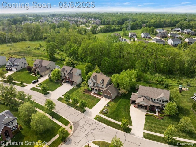 871 Wynstone Cir S, Oakland, MI 48363 - aerial perspective of suburban area featuring a heavily wooded area