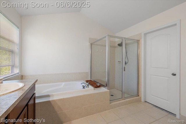 871 Wynstone Cir S, Oakland, MI 48363 - full bathroom with tile patterned flooring, a stall shower, a garden tub, vanity, and vaulted ceiling