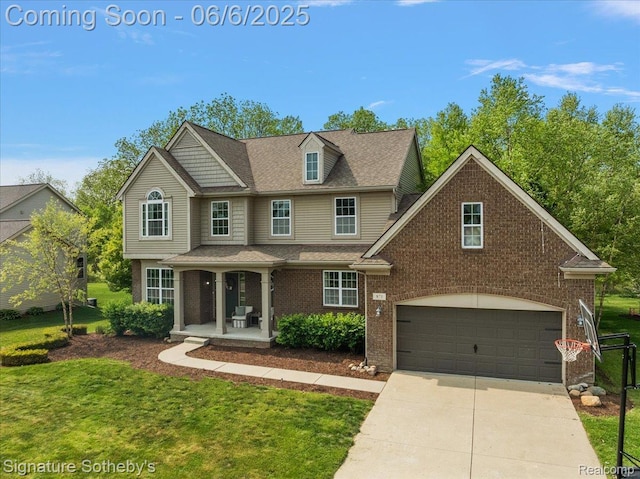 871 Wynstone Cir S, Oakland, MI 48363 - view of front of property featuring covered porch, a front yard, driveway, and brick siding
