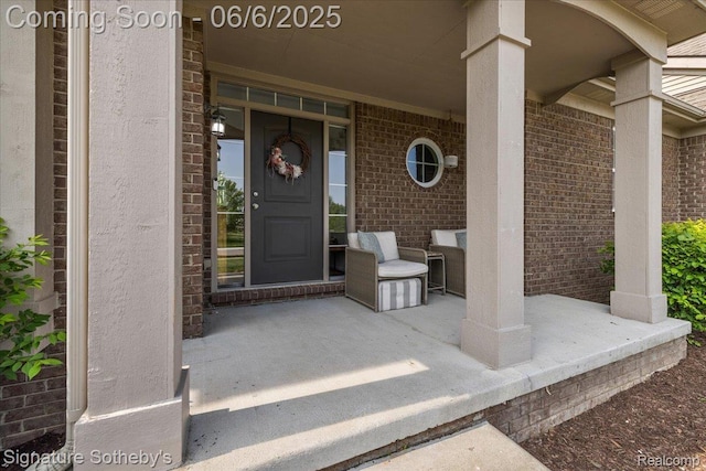 871 Wynstone Cir S, Oakland, MI 48363 - view of exterior entry with covered porch and brick siding