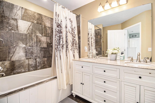 69698 Fox Xing, Edwardsburg, MI 49112 - full bathroom with tiled shower / bath combo and double vanity