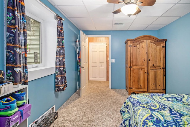 69698 Fox Xing, Edwardsburg, MI 49112 - bedroom with carpet, a paneled ceiling, and a ceiling fan