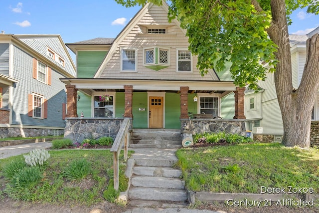 1237 Wealthy St SE, Grand Rapids, MI 49506 - view of front of house featuring a porch