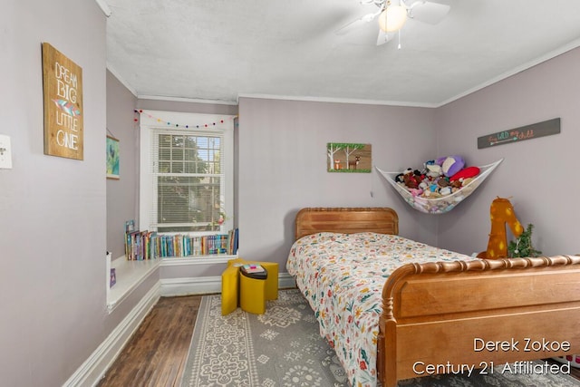 1237 Wealthy St SE, Grand Rapids, MI 49506 - bedroom featuring wood finished floors, baseboards, ornamental molding, and a ceiling fan