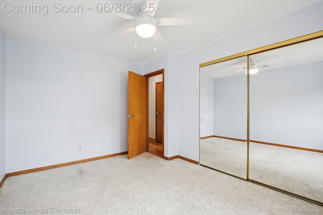 2734 Silverside Rd, Waterford, MI 48328 - unfurnished bedroom with carpet, baseboards, a closet, and ceiling fan