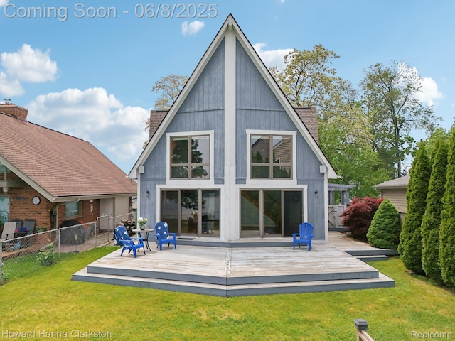 2734 Silverside Rd, Waterford, MI 48328 - rear view of house featuring a deck and a chimney